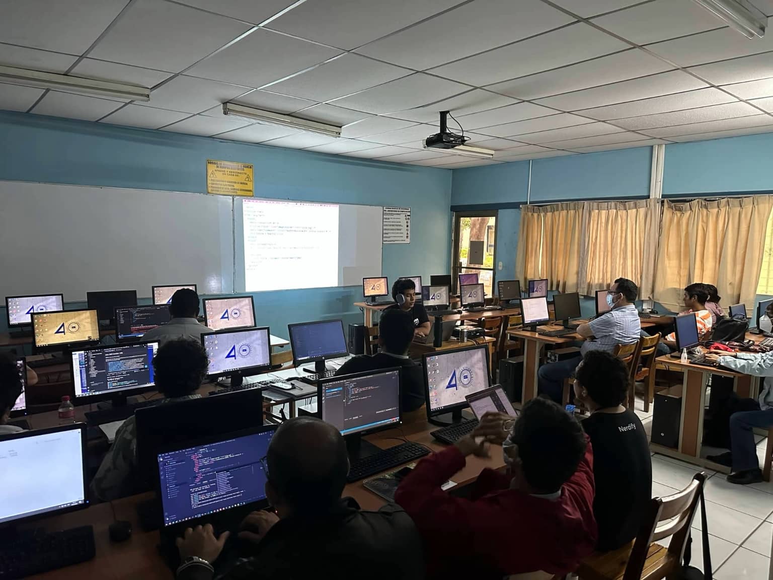 Nerdify developers sharing their experience and knowledge with professors from the National University of Engineering in Nicaragua